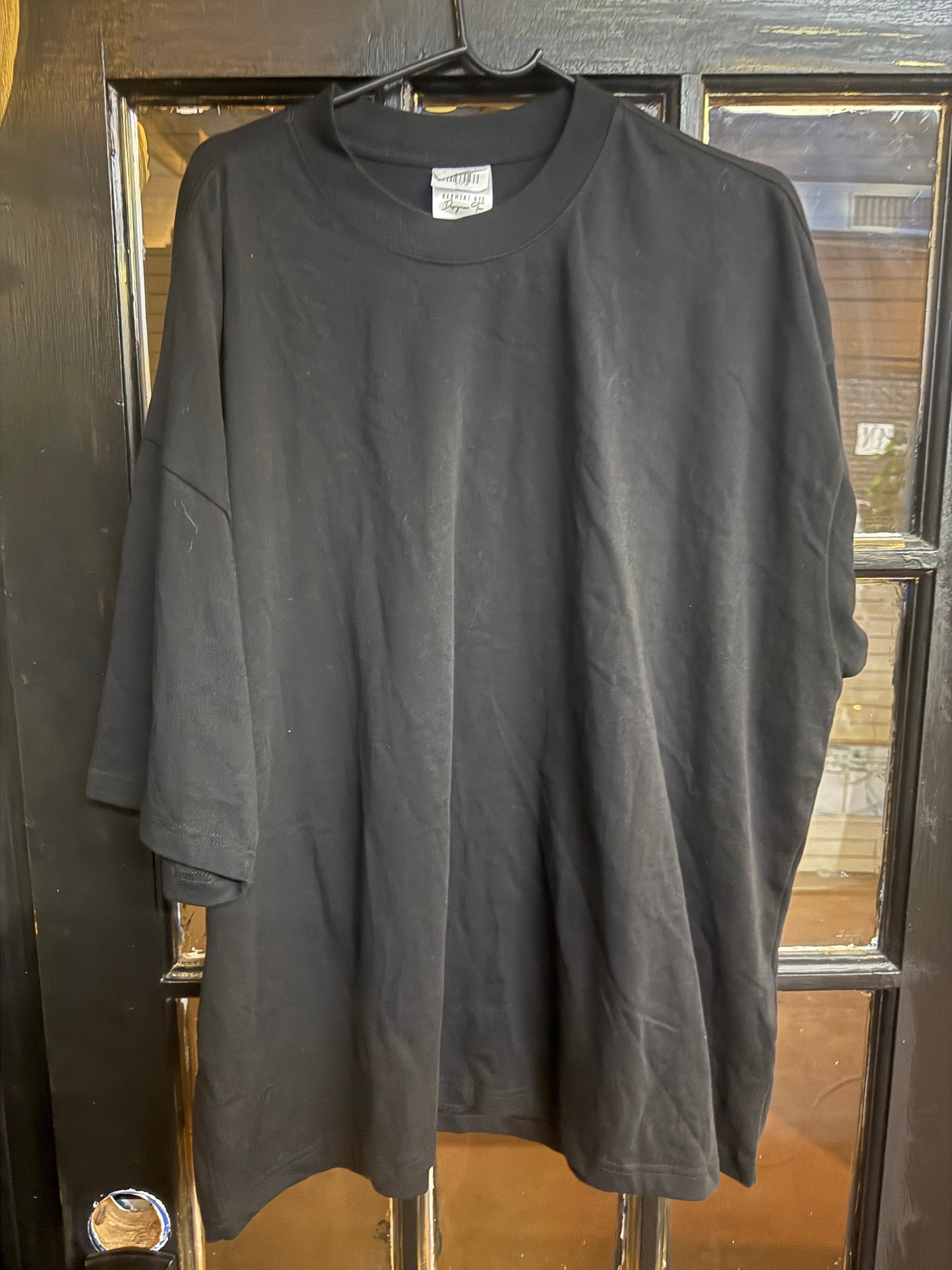 Black Garment Dye Designer Tee Short-sleeve Graphic t-shirt size xl that reads "BLACK HOLLYWOOD"