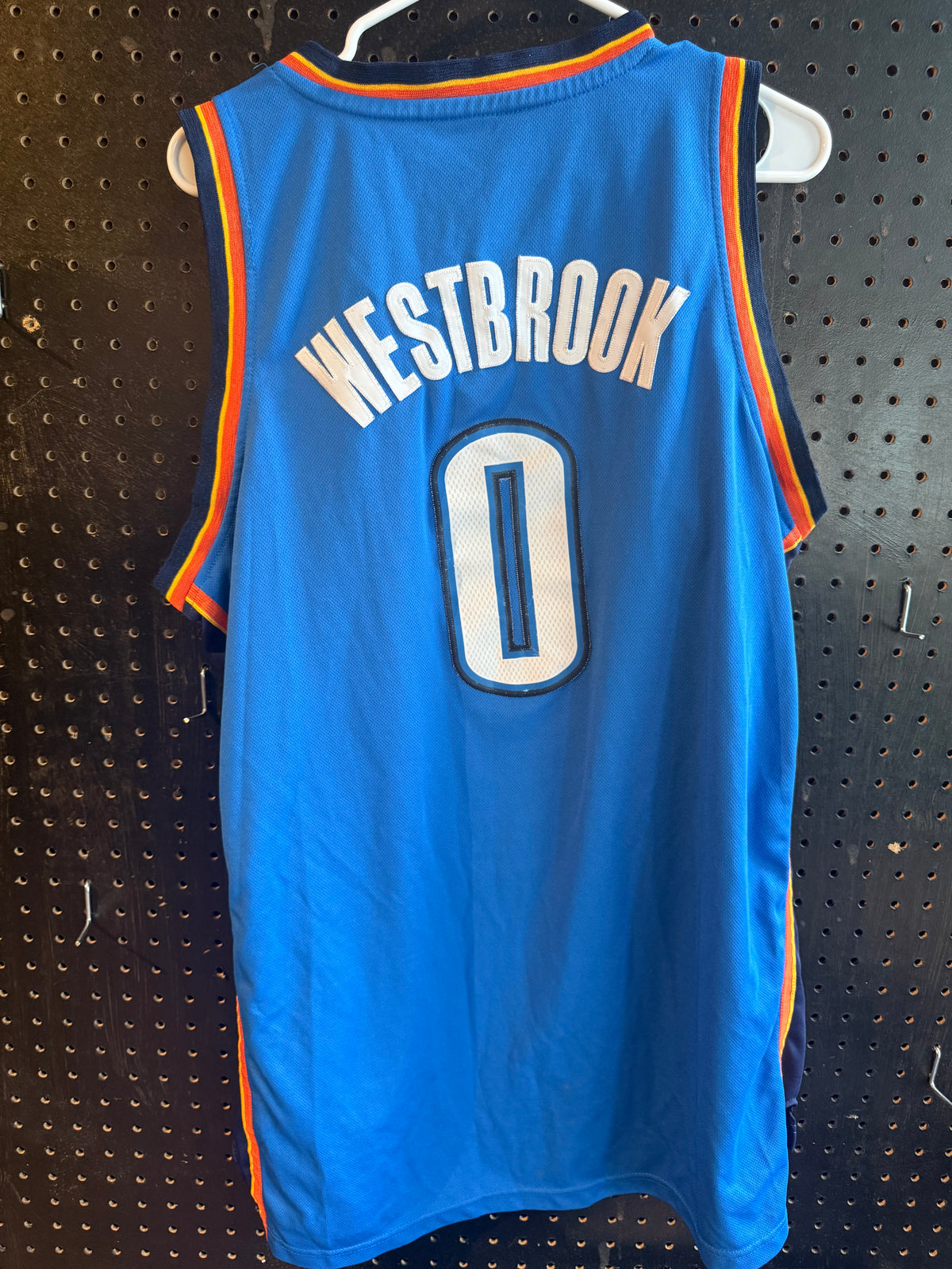 Adidas Russell Westbrook Oklahoma City Thunder jersey featuring his number "0" and name "Westbrook". Size large