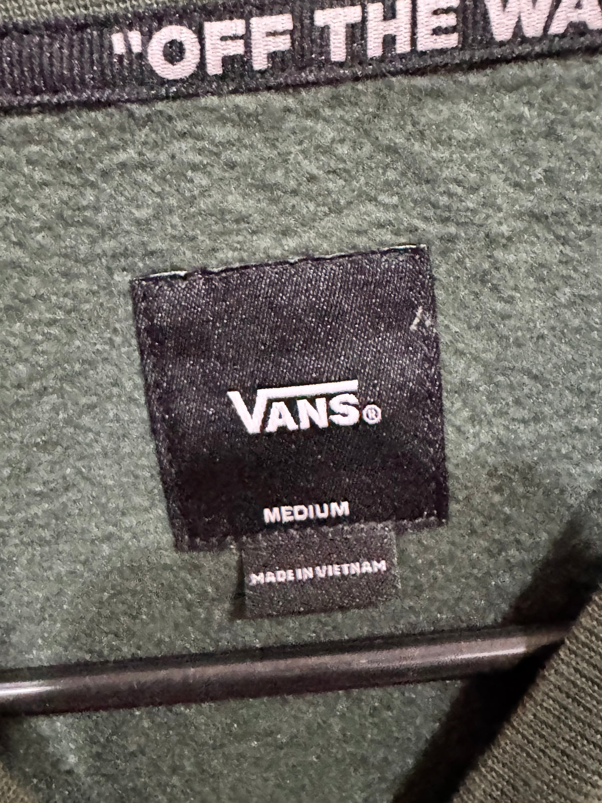 dark green Vans sweatshirt size medium "Off the Wall" logo patch on the back