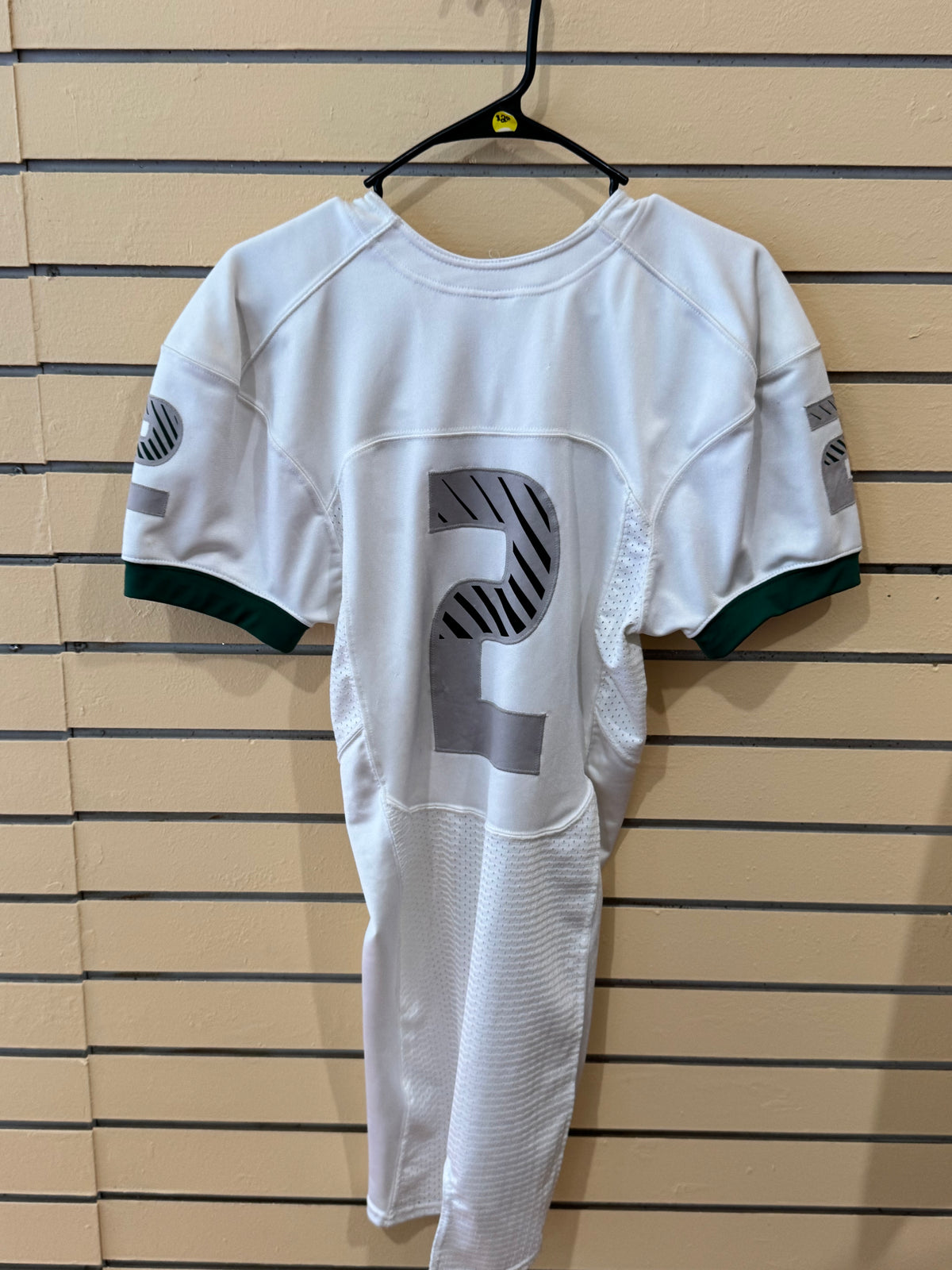 Nike Miami Dade white football jersey size small featuring the number 2 and green sleeve cuffs