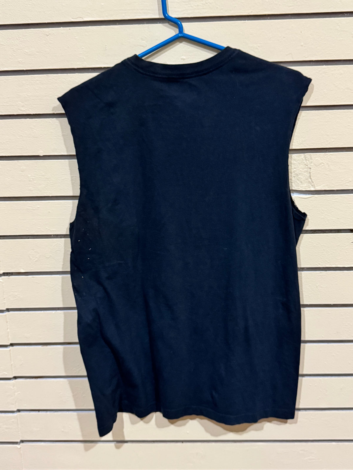 Nike Dry-FIT women's sleeveless tank top shirt featuring a large, white "JUST DO IT." graphic. Size medium