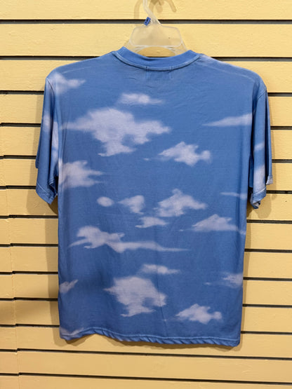 Official Prince merchandise blue sky and white clouds all-over print crew neck t-shirt size medium featuring the iconic Love Symbol on the inner neck label.