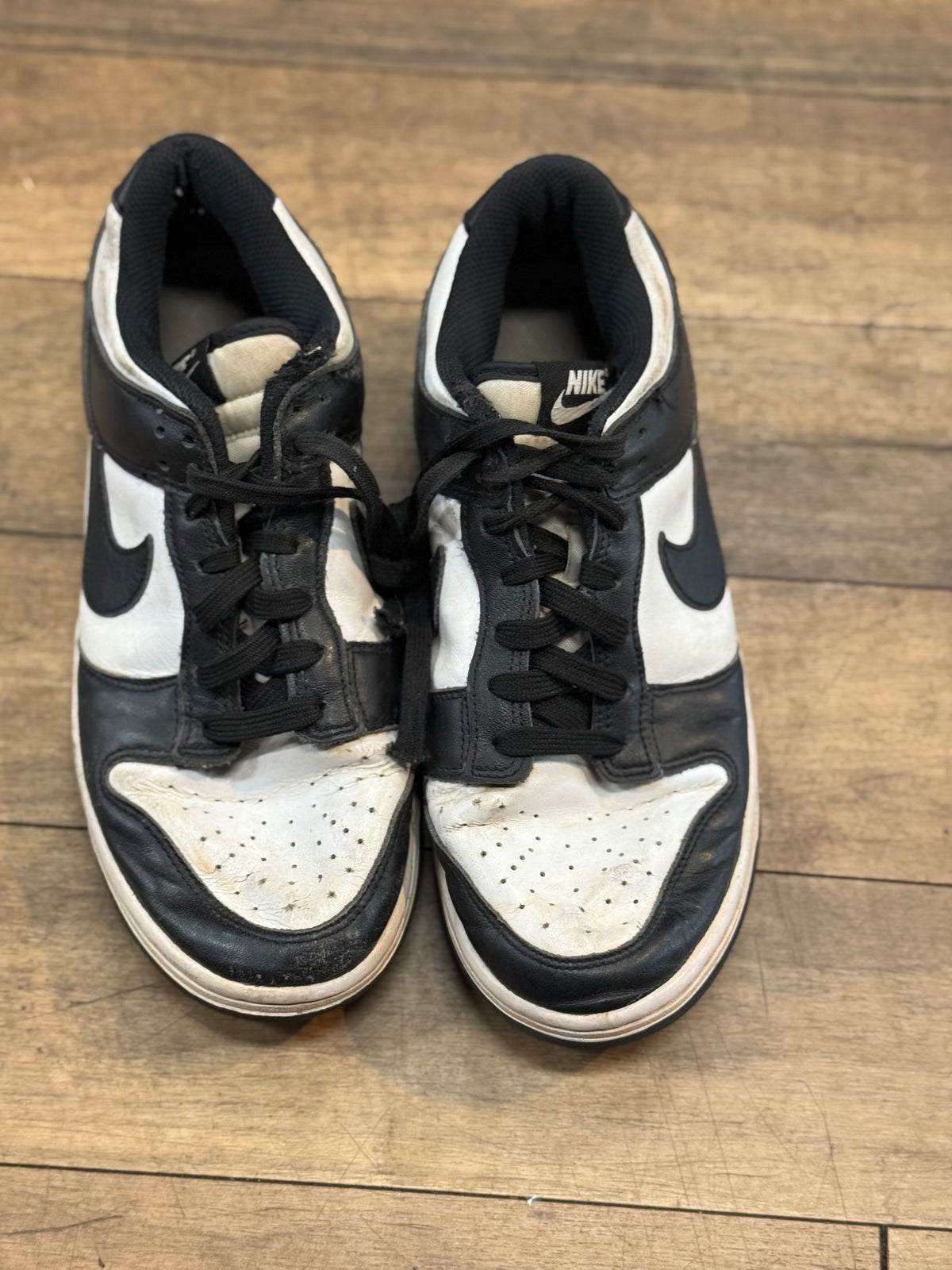 Nike Dunk Low sneakers in the popular black and white "Panda" color way size 9