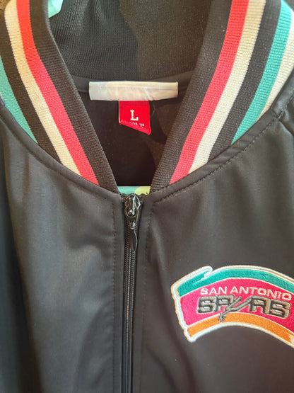 Mitchell & Ness San Antonio Spurs NBA jacket featuring a black finish and teal, pink, and white ribbed trim size large