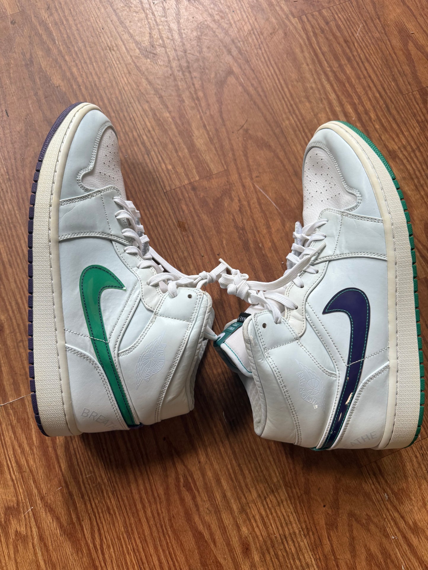 Nike Air Jordan 1 Mid SE "Mindfulness" size 13 from the Pregame Pack, featuring a white leather upper with a green Swoosh