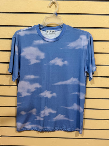 Official Prince merchandise blue sky and white clouds all-over print crew neck t-shirt size medium featuring the iconic Love Symbol on the inner neck label.