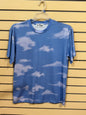 Official Prince merchandise blue sky and white clouds all-over print crew neck t-shirt size medium featuring the iconic Love Symbol on the inner neck label.