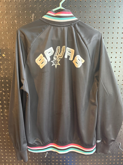 Mitchell & Ness San Antonio Spurs NBA jacket featuring a black finish and teal, pink, and white ribbed trim size large
