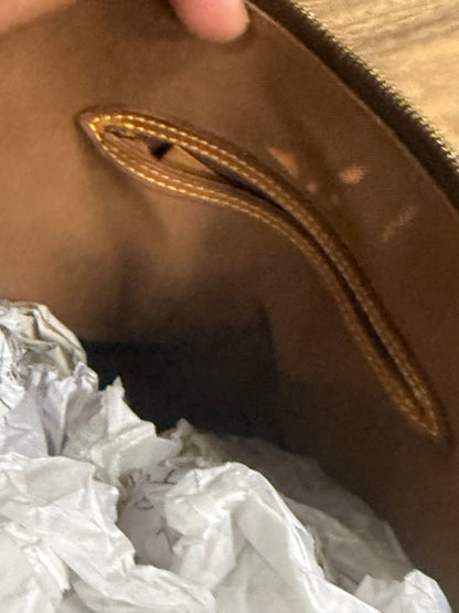 The Custom Authentic 1 of 1 Louis Vuitton Monogram Alma handbag is a luxurious and iconic piece