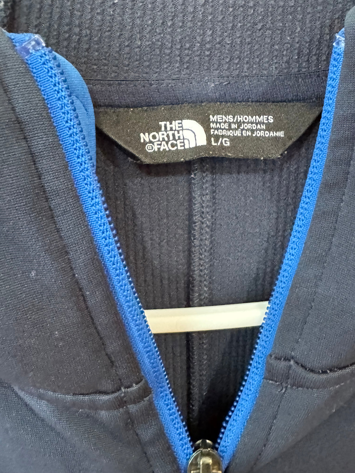 North Face Men's Apex Canyonwall Hybrid Hoodie size large in blue with prominent orange logo and zipper detailing.
