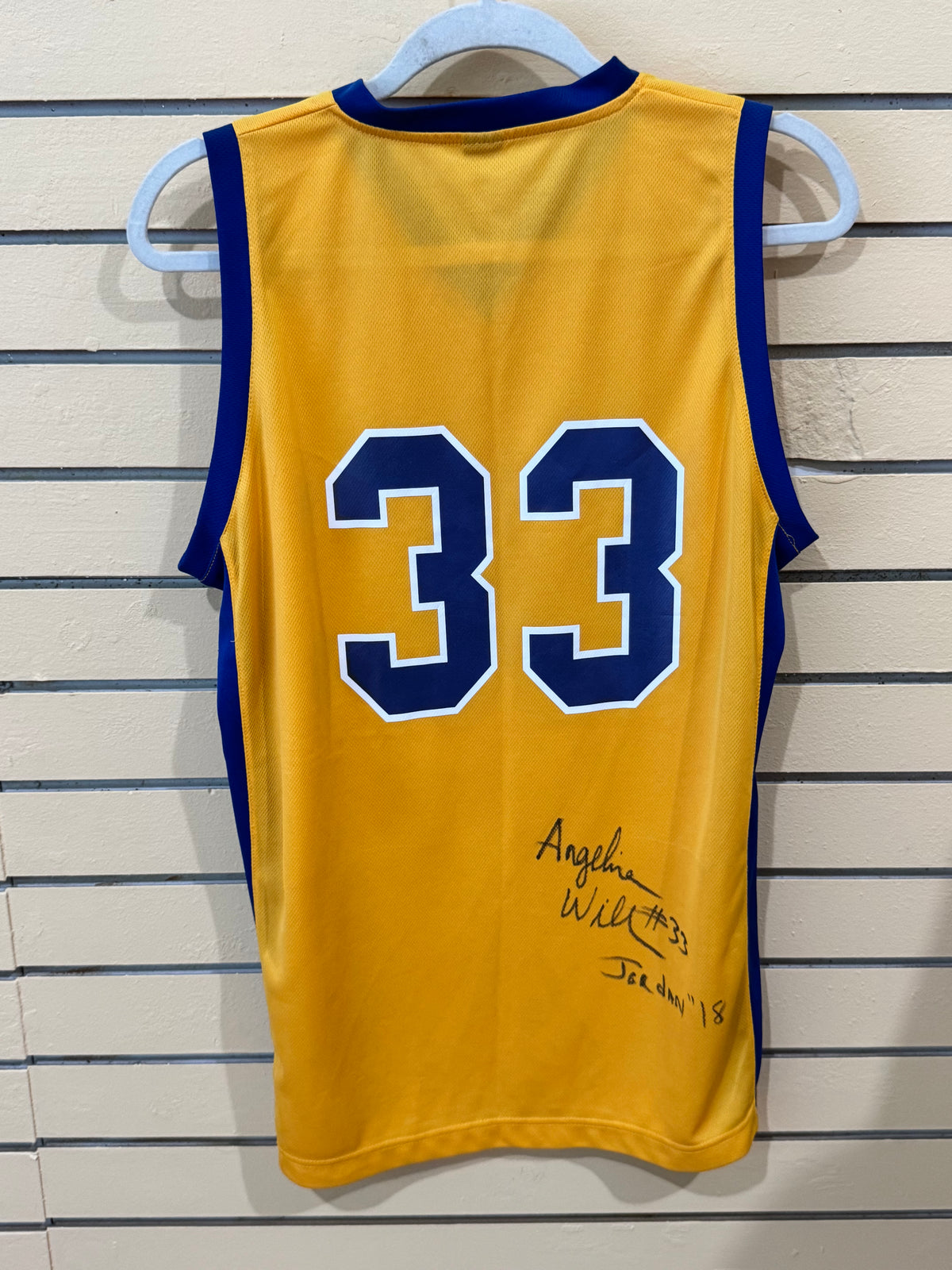 Blue Dunes Club signed basketball jersey size medium number 33 graphic and a wave chest detail.