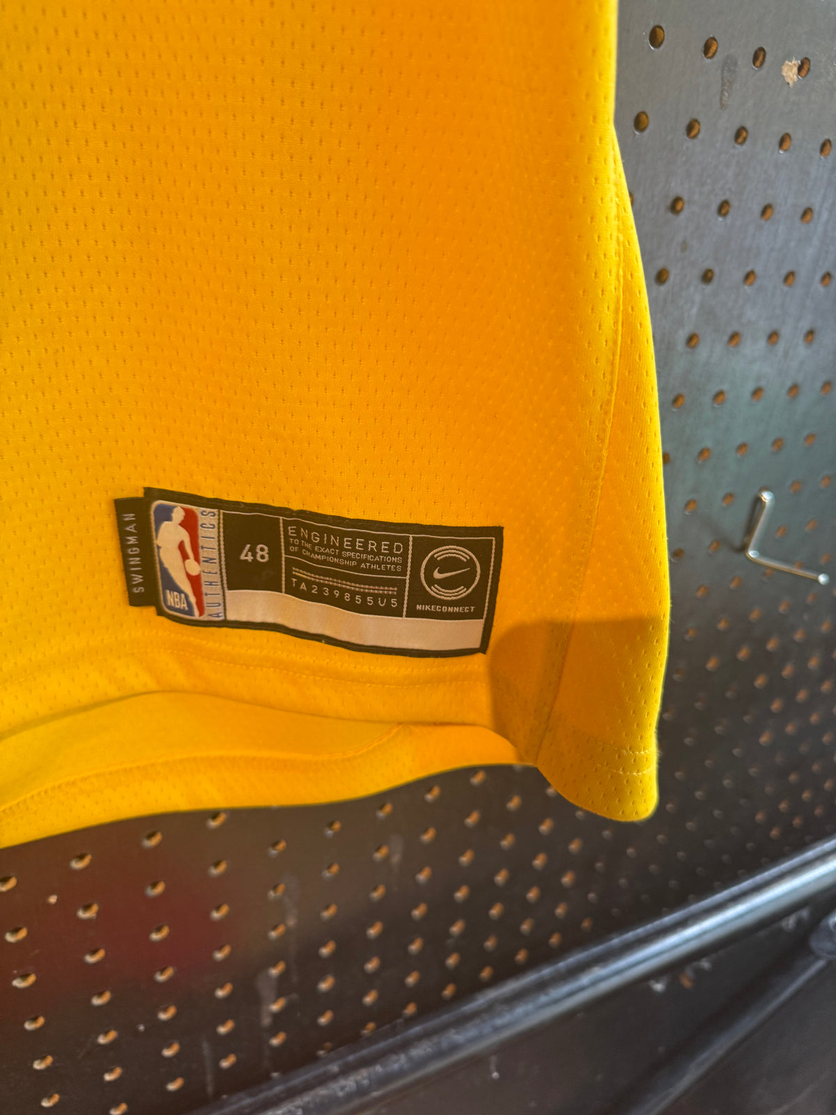 Nike LeBron James Los Angeles Lakers Icon Swingman Jersey, featuring gold mesh material and purple and white details size 48