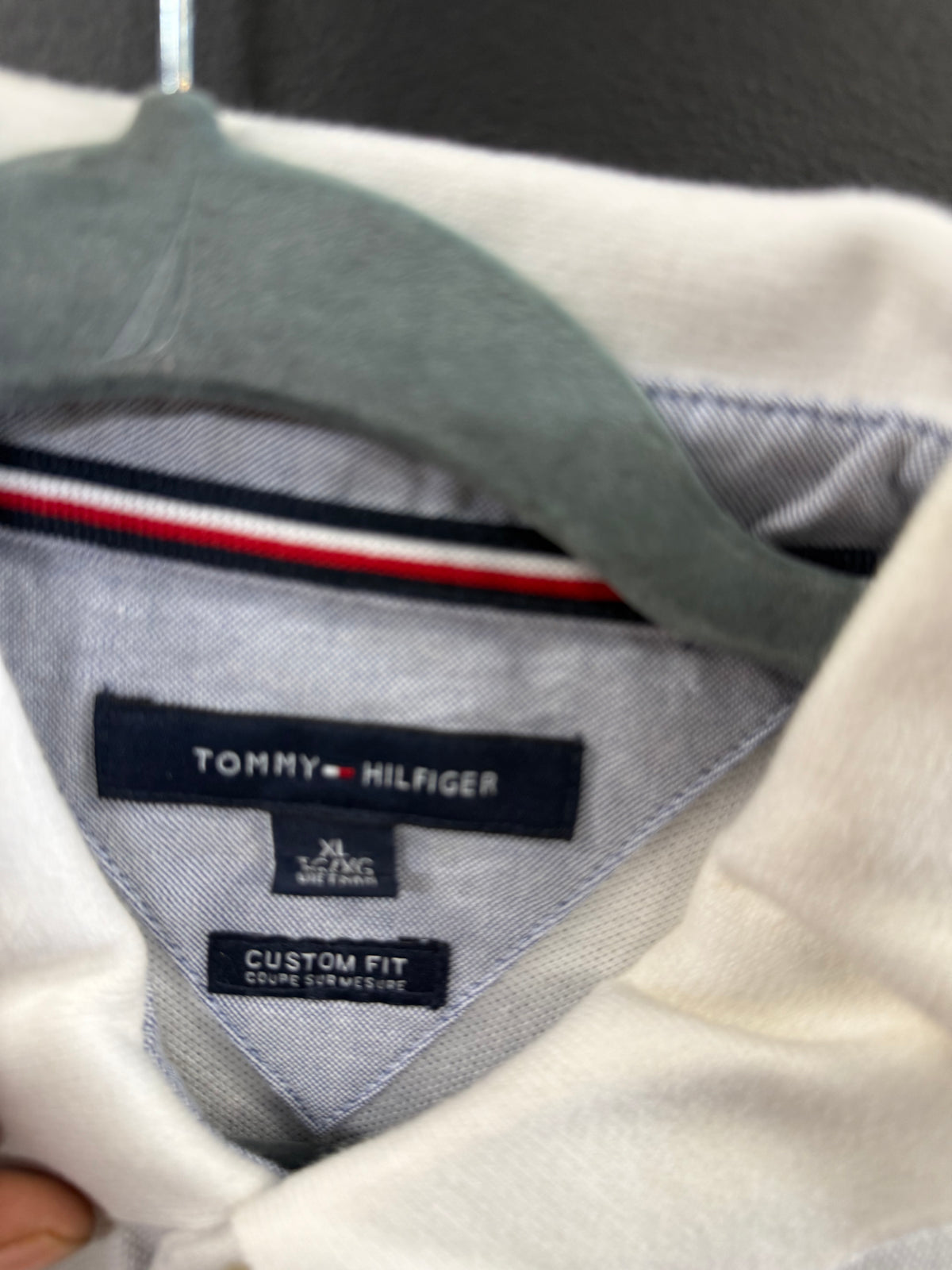 White Tommy Hilfiger custom-fit pique polo shirt size xl with a navy blue embroidered "H" logo
