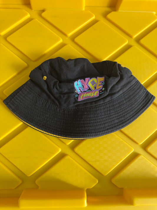black The Hype House reversible bucket hat featuring a colorful embroidered logo on the front panel