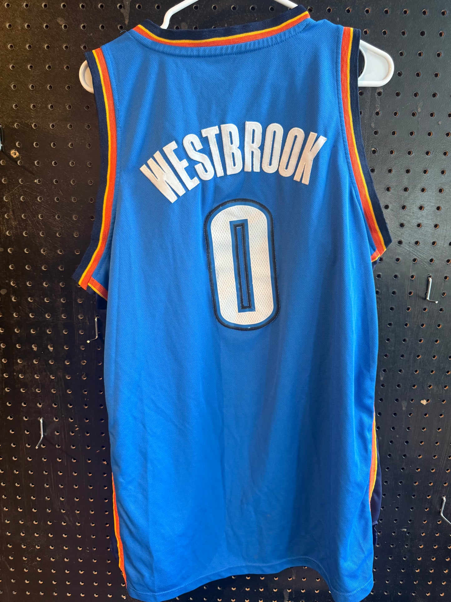 Adidas Russell Westbrook Oklahoma City Thunder jersey featuring his number "0" and name "Westbrook". Size large