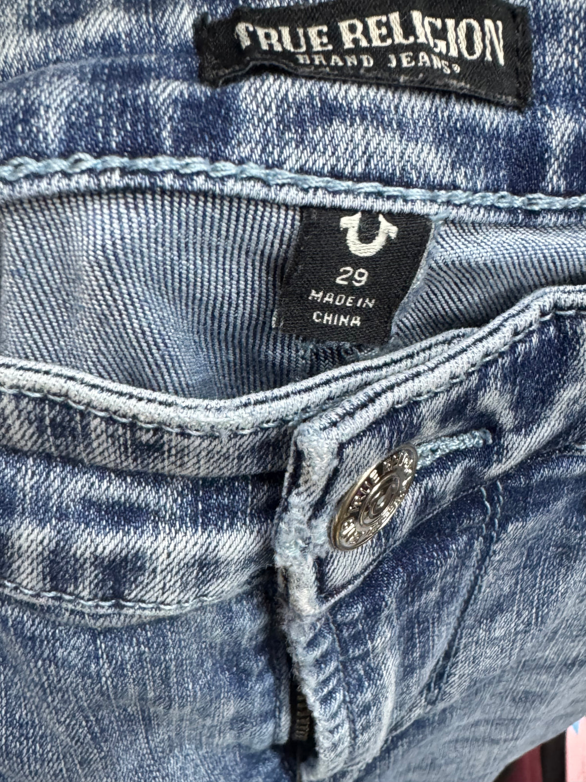 Light-wash True Religion Denim Cutoff Shorts size 29