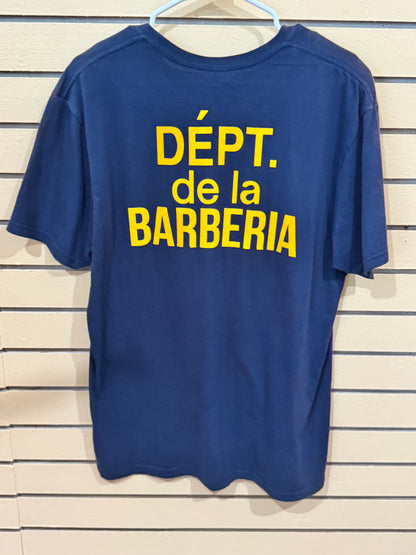 blue cotton graphic t-shirt size large featuring the yellow text "DÉPT. de la BARBERIA" printed on the back