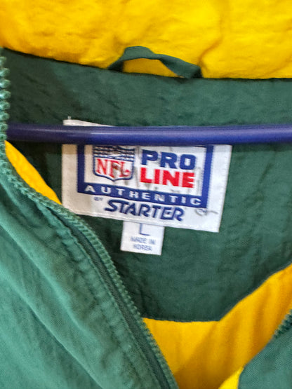 Vintage 1990s NFL Pro Line Green Bay Packers Starter half-zip pullover jacket size large, front pouch pocket and a packable hood.