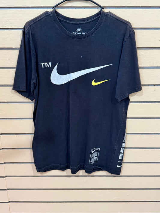 black Nike t-shirt features a large white swoosh logo size medium