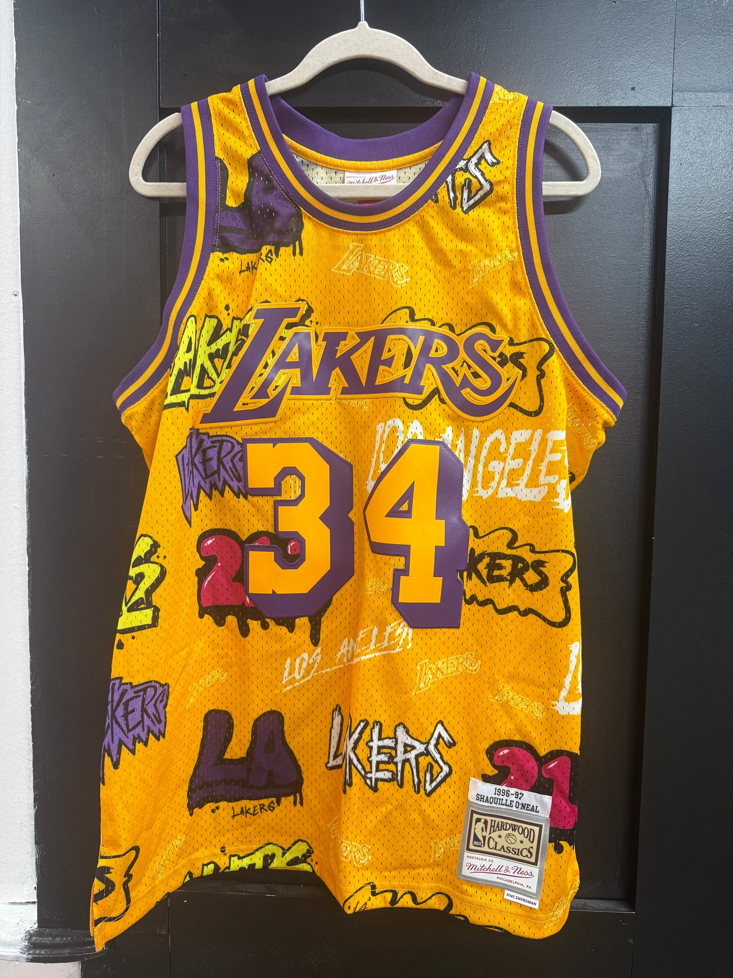 Mitchell & Ness NBA "Slap Sticker" Swingman jersey for Shaquille O'Neal and the Los Angeles Lakers. Size Large