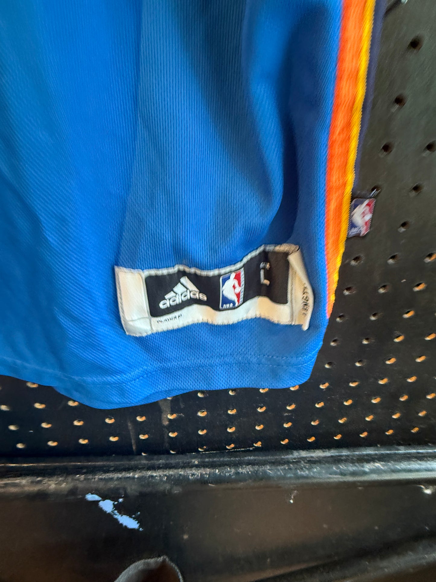 Adidas Russell Westbrook Oklahoma City Thunder jersey featuring his number "0" and name "Westbrook". Size large