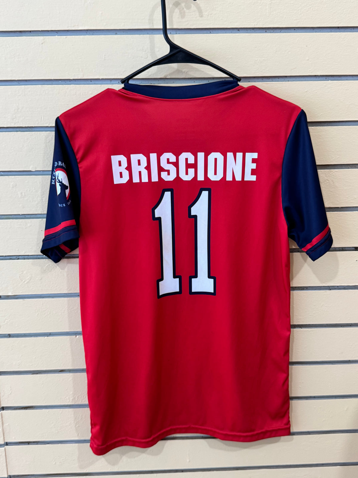 Atlanta Braves red and navy V-neck jersey size youth large briscione number 11