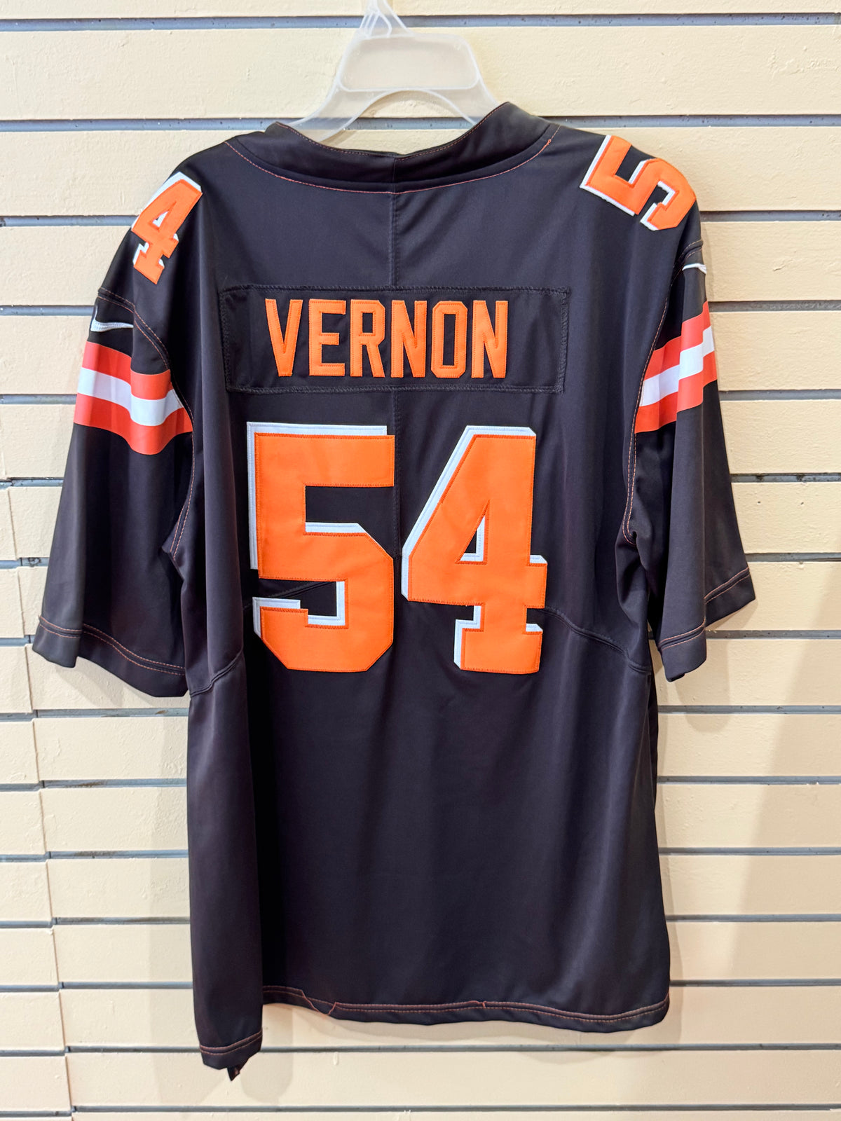 Nike Cleveland Browns #54 brown home game jersey size XL orange and white block letters and "Dawg Pound" in collar
