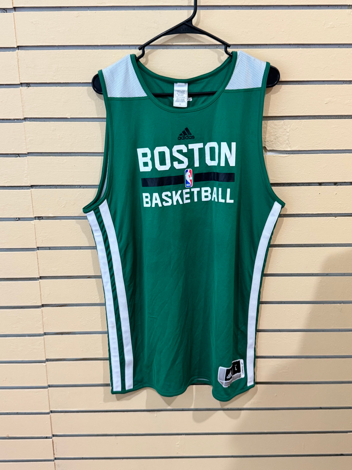 Adidas Boston Celtics NBA practice jersey size large features Rondo #9 and prominent "BOSTON BASKETBALL"