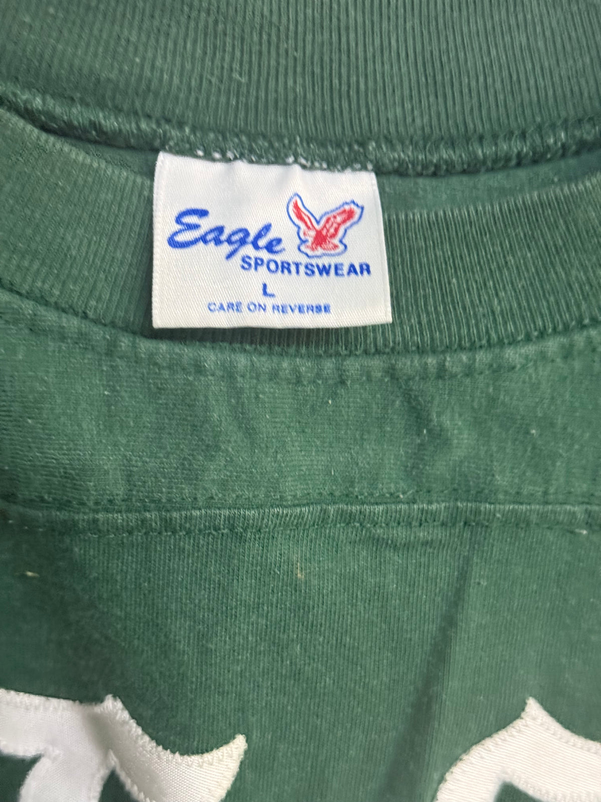 Dark Green Vintage-style Athletic Jersey size large featuring "IS CHAUTAUQUA"