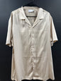 ASOS DESIGN short-sleeve satin camp-collar shirt in a smooth champagne hue.