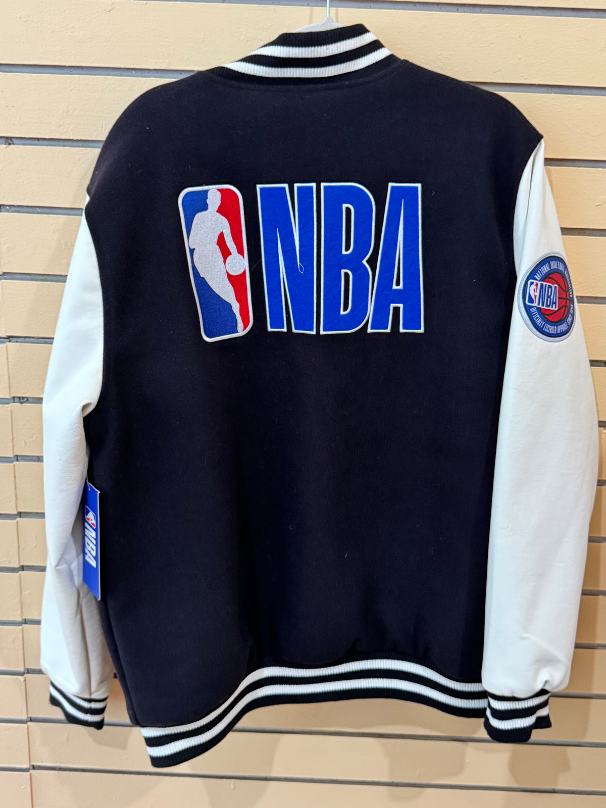 NBA official size large black and white varsity jacket wool-style body with contrasting sleeves and embroidered logos.