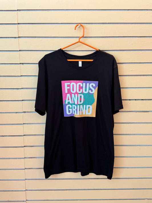 Black Short-sleeve Graphic t-shirt size xl with the words "FOCUS AND GRIND" printed on the chest.