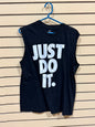 Nike Dry-FIT women's sleeveless tank top shirt featuring a large, white "JUST DO IT." graphic. Size medium