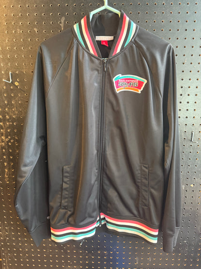 Mitchell & Ness San Antonio Spurs NBA jacket featuring a black finish and teal, pink, and white ribbed trim size large