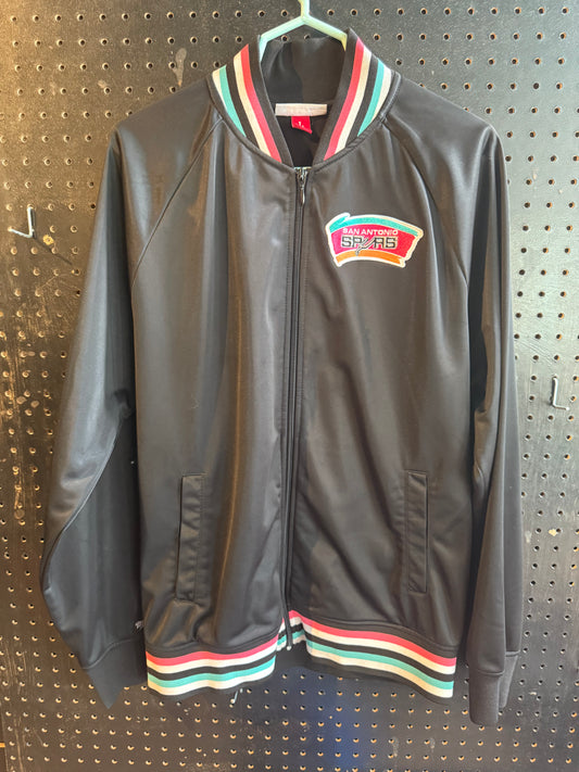 Mitchell & Ness San Antonio Spurs NBA jacket featuring a black finish and teal, pink, and white ribbed trim size large